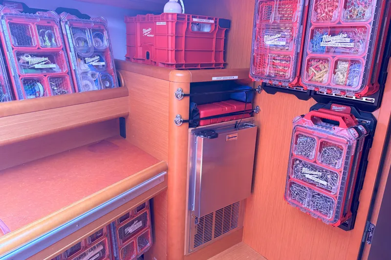Slide: The Image of Organized storage area on a 2012 Jeanneau 57 yacht with Milwaukee toolboxes. - 40