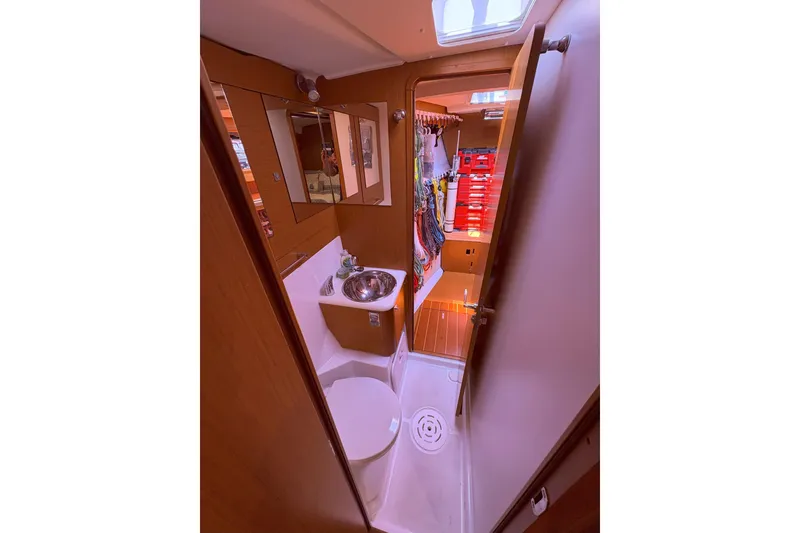 Slide: The Image of Interior of 2012 Jeanneau 57 yacht bathroom with sink and storage. - 42