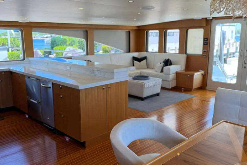 Slide: The Image of Luxurious interior of 2011 Pedigree Cat Sportfish Catamaran with modern kitchen and seating area. - 20
