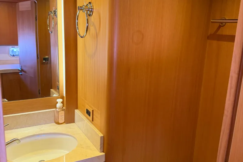 Slide: The Image of Luxurious bathroom interior of 2011 Pedigree Cat Sportfish Catamaran with wooden finish and modern fixtures. - 58