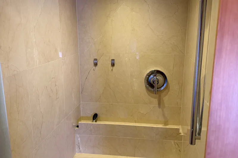 Slide: The Image of Luxurious marble shower interior on 2011 Pedigree Cat Sportfish Catamaran. - 59