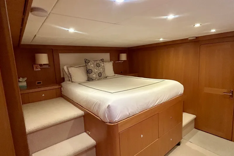 Slide: The Image of Luxurious bedroom interior of 2011 Pedigree Cat Sportfish Catamaran with elegant wood finish. - 64