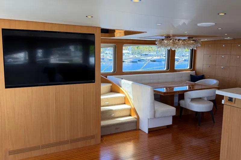 Slide: The Image of Luxurious interior of 2011 Pedigree Cat Sportfish Catamaran with dining area and large TV. - 18