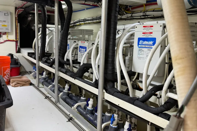 Slide: The Image of Engine room of 2011 Pedigree Cat Sportfish Catamaran with Cruisair systems and wiring. - 66