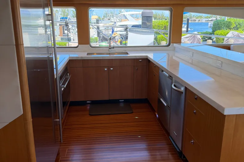 Slide: The Image of Luxurious kitchen interior of 2011 Pedigree Cat Sportfish Catamaran with modern appliances and scenic views. - 22
