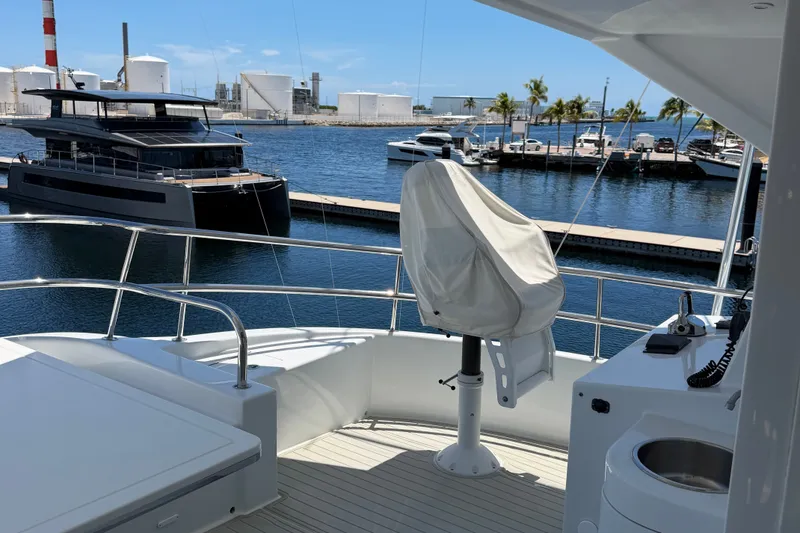 Slide: The Image of 2011 Pedigree Cat Sportfish Catamaran docked at marina, featuring sleek design and modern amenities. - 10
