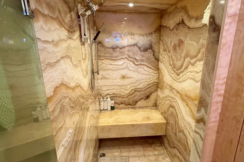 Slide: The Image of Luxurious marble shower interior on a 2011 Pedigree Cat Sportfish Catamaran. - 39