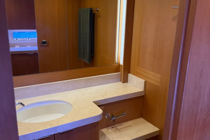 Slide: The Image of Luxurious bathroom interior of 2011 Pedigree Cat Sportfish Catamaran with marble countertop. - 52