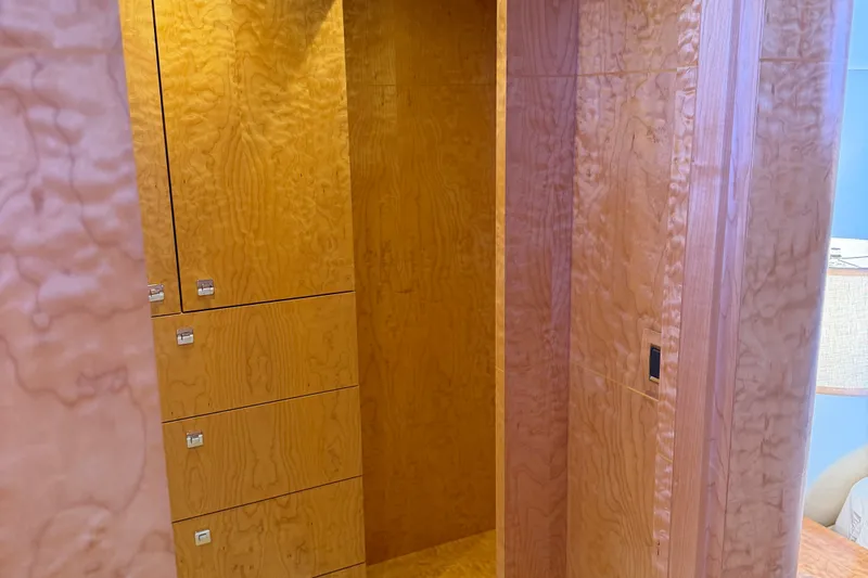 Slide: The Image of Luxurious wood interior of 2011 Pedigree Cat Sportfish Catamaran, featuring sleek cabinetry design. - 41