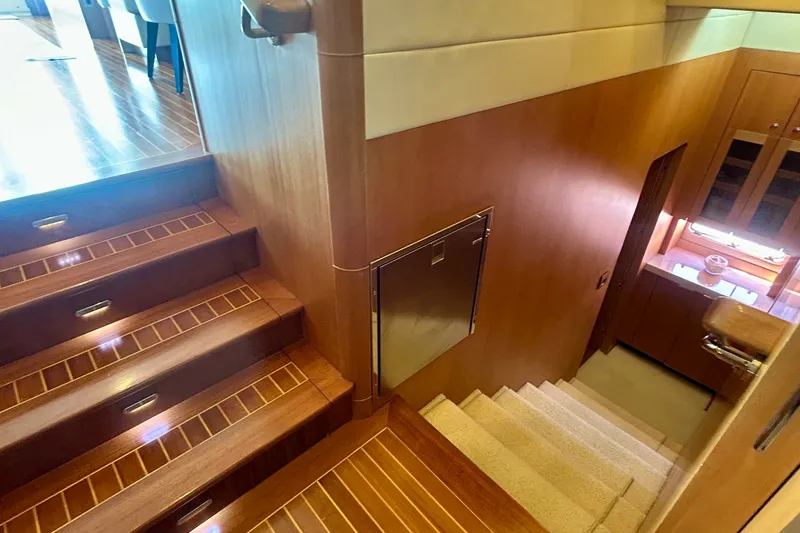 Slide: The Image of Interior of 2011 Pedigree Cat Sportfish Catamaran with wooden stairs and modern design. - 31