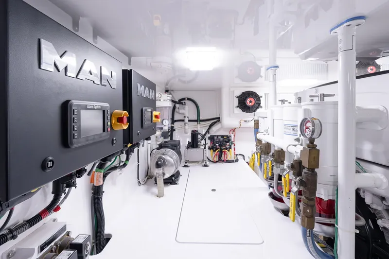 Slide: The Image of Engine room of 2022 Viking 48 Convertible yacht with MAN systems and equipment. - 55
