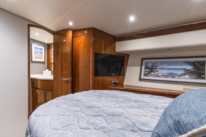 Slide: The Image of Luxurious bedroom interior of 2022 Viking 48 Convertible yacht with modern amenities. - 45