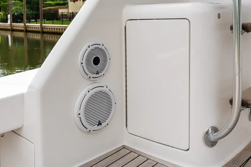 Slide: The Image of 2022 Viking 48 Convertible yacht with exterior speakers and sleek design. - 15