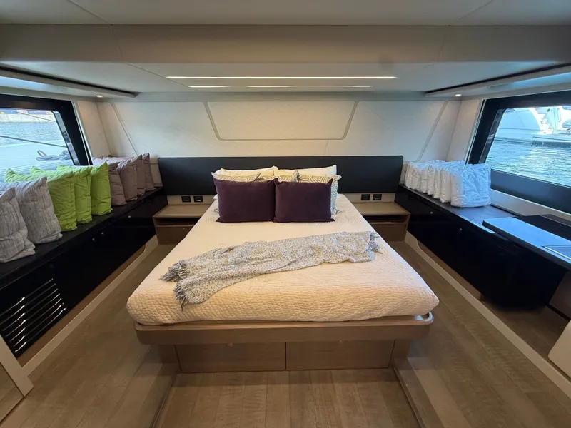 Slide: The Image of Luxurious bedroom with large windows and elegant decor on a yacht. - 46
