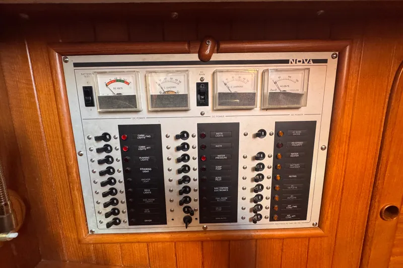 Slide: The Image of Electrical panel on 1986 Tashing Tashiba 31 sailboat with gauges and switches. - 28