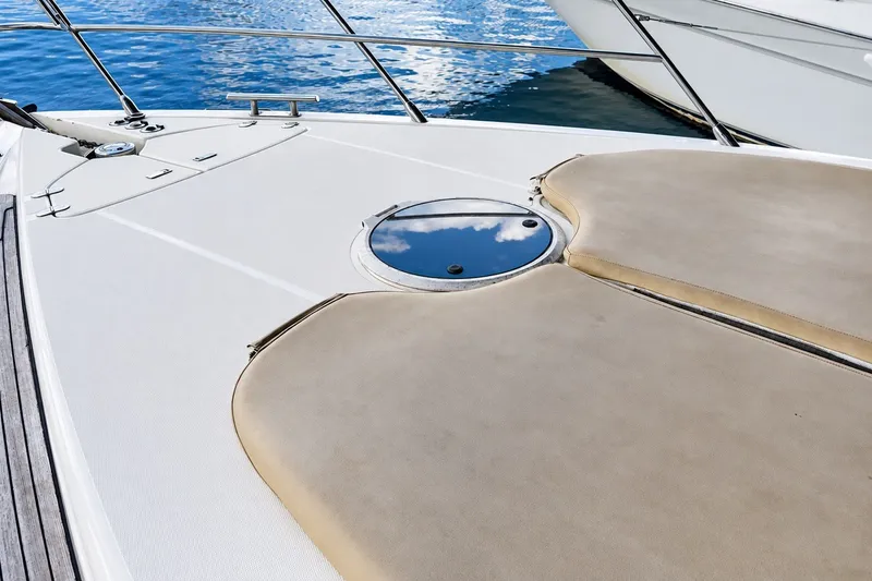 Slide: The Image of Bow deck of 2004 Azimut 62 yacht with sun pads and ocean view. - 38