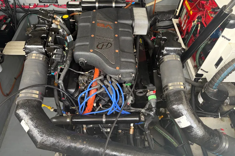 Slide: The Image of Engine compartment of a 1999 Sea Ray 370 Express Cruiser boat. - 34