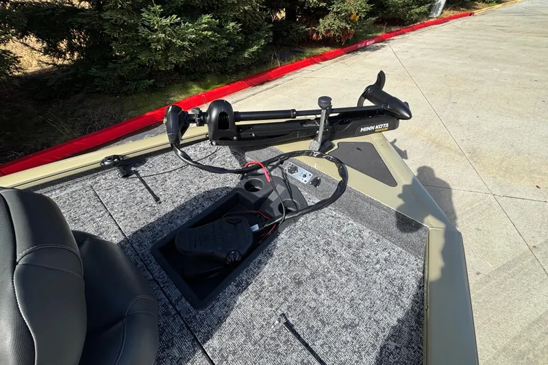 Slide: The Image of 2026 Tracker Pro Team 195 boat deck with Minn Kota trolling motor. - 14