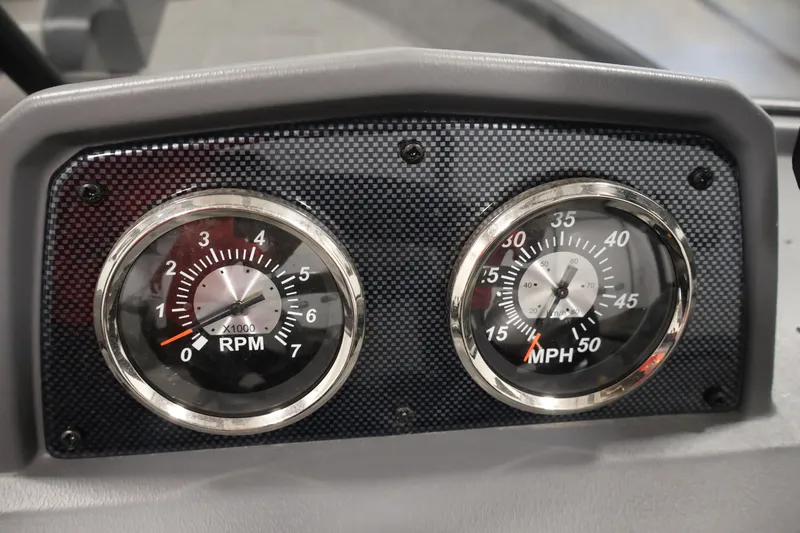 Slide: The Image of Dashboard of 2022 Lowe Fishing Machine 1625WT showing RPM and MPH gauges. - 22