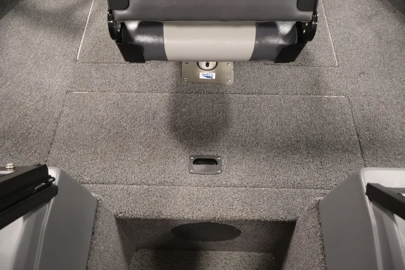 Slide: The Image of 2022 Lowe Fishing Machine 1625WT interior with gray carpet and seating. - 17