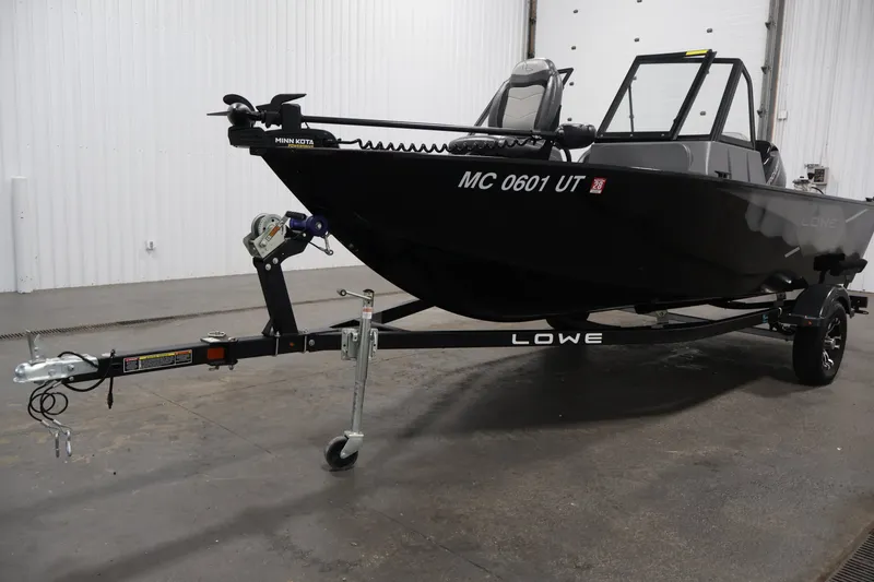 Slide: The Image of 2022 Lowe Fishing Machine 1625WT on trailer in indoor storage facility. - 41