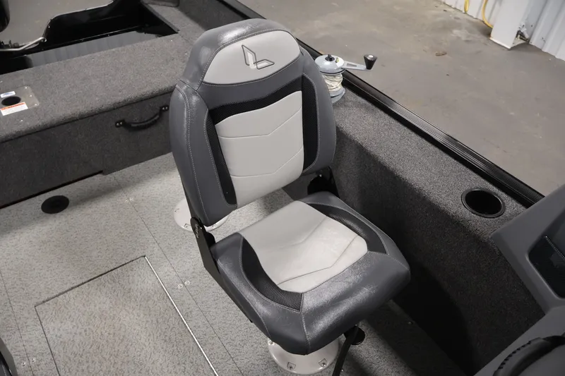 Slide: The Image of 2022 Lowe Fishing Machine 1625WT boat seat, gray and white design, interior view. - 29