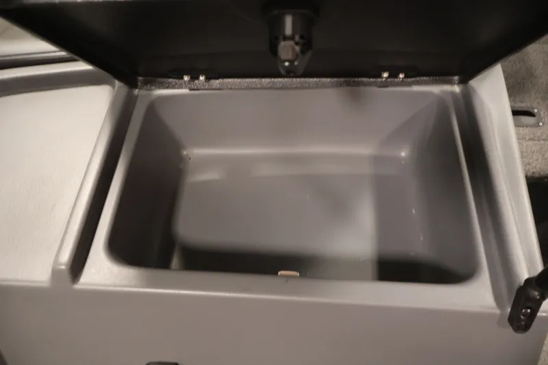 Slide: The Image of Open storage compartment in 2022 Lowe Fishing Machine 1625WT boat. - 28