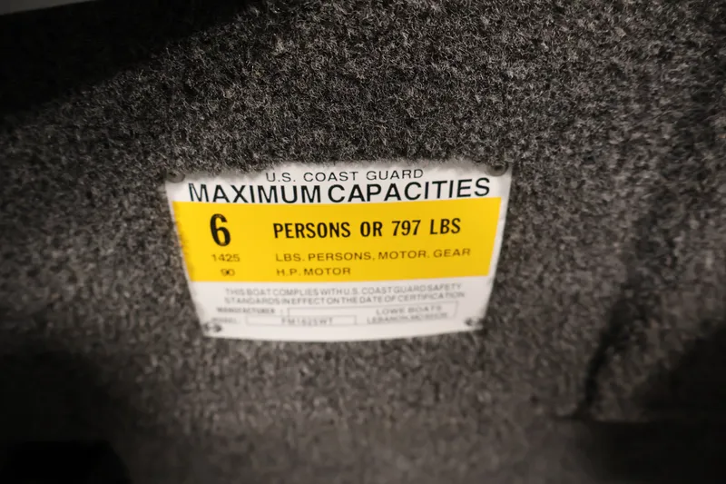 Slide: The Image of Capacity label on 2022 Lowe Fishing Machine 1625WT, maximum 6 persons or 797 lbs. - 25