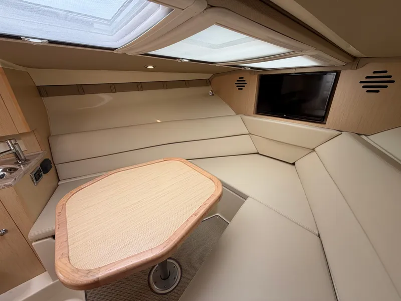 Slide: The Image of Interior of the 2020 Chris-Craft Corsair 34 with elegant seating area and table. - 41