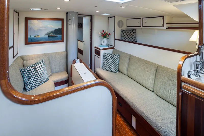 Slide: The Image of Luxurious 1970 Sparkman & Stephens 57 yacht interior with elegant seating and nautical decor. - 2