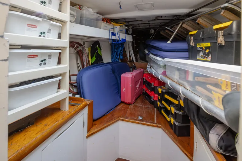 Slide: The Image of Storage area on a 1970 Sparkman & Stephens 57 yacht, filled with tools and equipment. - 18