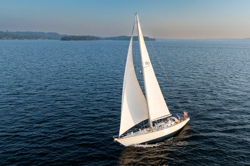 Slide: The Image of Sailing yacht Sparkman & Stephens 57 from 1970 gliding on open water. - 27