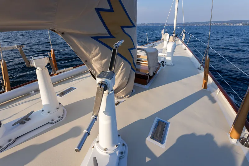 Slide: The Image of Deck view of a 1970 Sparkman & Stephens 57 sailboat on open water. - 23