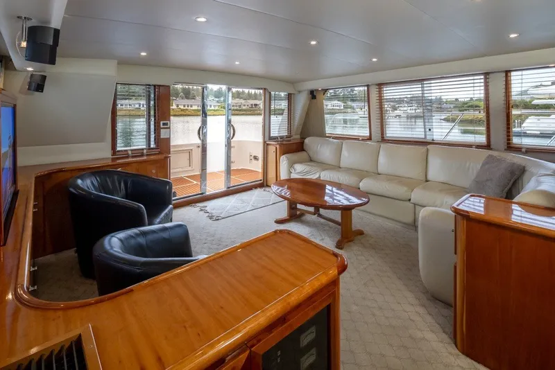 Slide: The Image of Luxurious 2004 Navigator Pilothouse yacht interior with leather seating and wooden accents. - 13