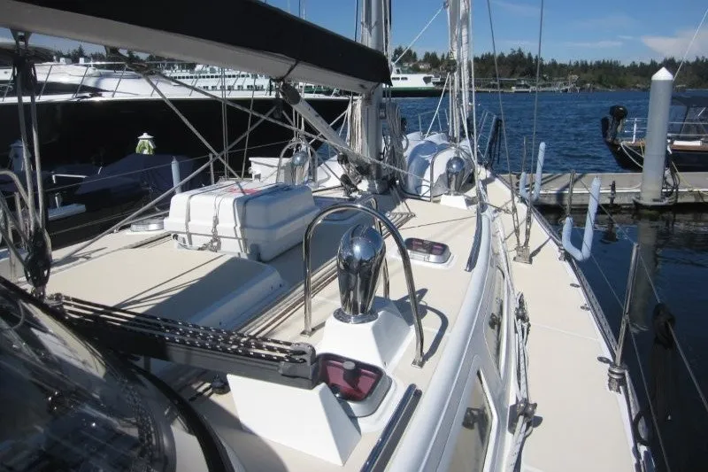 Slide: The Image of Sailing yacht Outbound 46, 2014 model, docked at marina with clear blue skies. - 38
