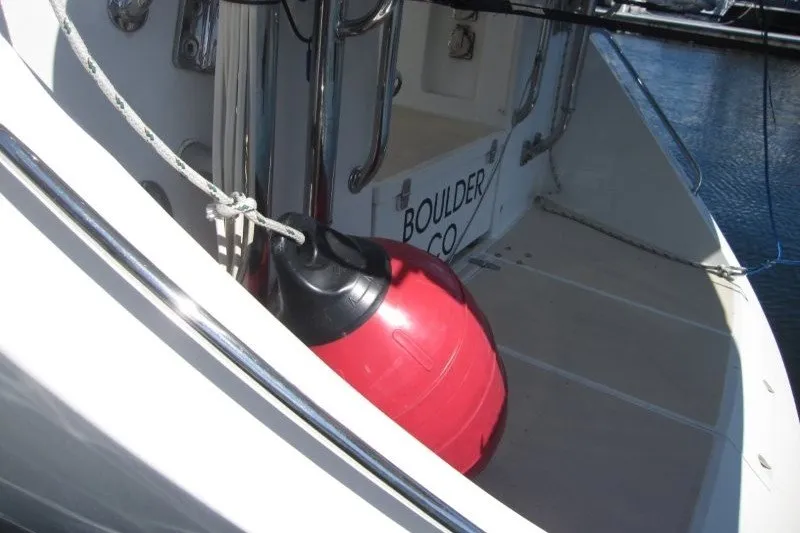 Slide: The Image of Sailboat stern with red buoy, Outbound 46, 2014 model, docked in Boulder, CO. - 54