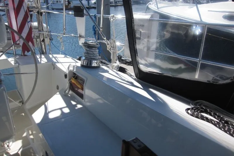 Slide: The Image of Cockpit of 2014 Outbound 46 sailboat with winch and American flag. - 29