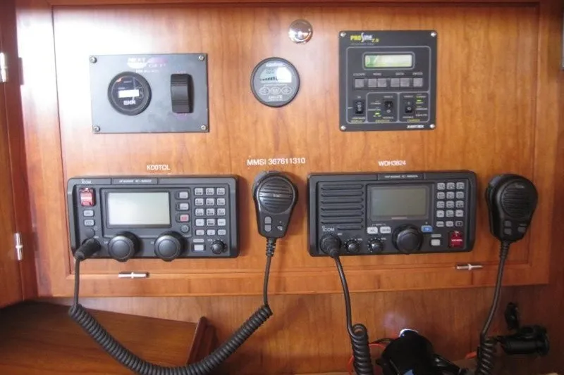 Slide: The Image of Navigation and communication equipment on a 2014 Outbound 46 yacht control panel. - 13