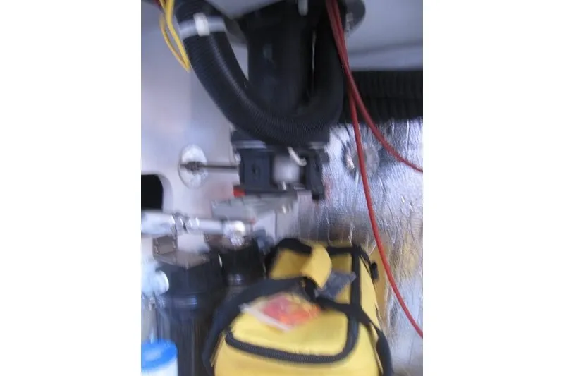 Slide: The Image of Blurred mechanical equipment with yellow bag, Outbound 46, 2014 model. - 22