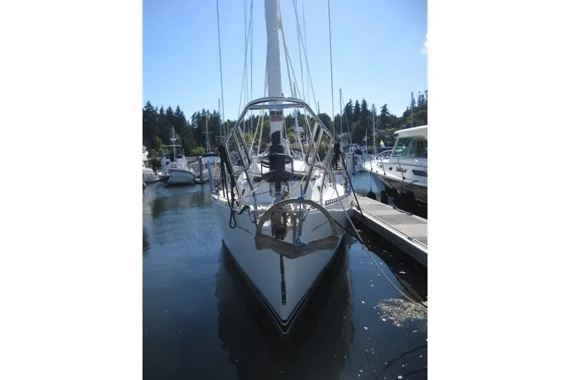 Slide: The Image of Sailboat docked at marina, 2014 Outbound 46 model, sunny day. - 52