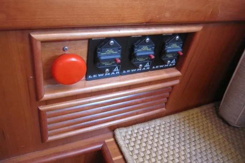 Slide: The Image of Control panel with Lewmar switches on a 2014 Outbound 46 yacht. - 26