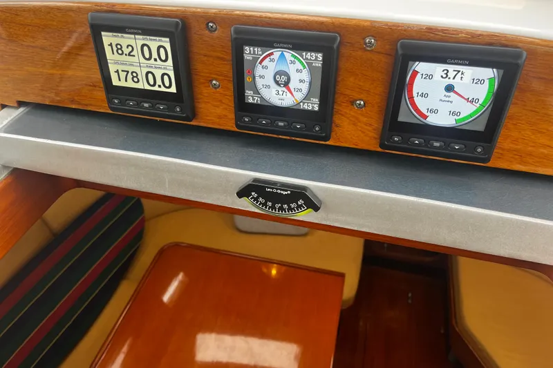 Slide: The Image of Cockpit of 1994 Hylas 49 yacht with Garmin navigation instruments. - 57