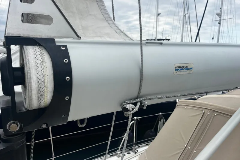 Slide: The Image of Schaefer boom furling system on a 1994 Hylas 49 sailboat. - 44