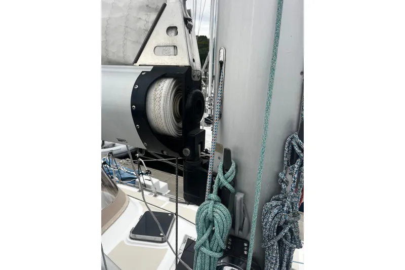 Slide: The Image of Close-up of a 1994 Hylas 49 sailboat mast with ropes and rigging details. - 45