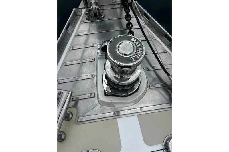 Slide: The Image of Anchor windlass on 1994 Hylas 49 yacht deck, featuring Maxwell branding. - 41