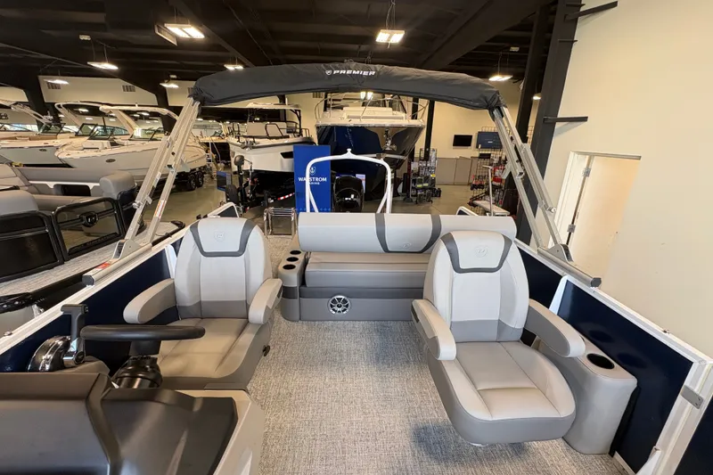 Slide: The Image of 2027 Premier 220 Sunscape RL - DL pontoon boat interior with plush seating and modern design. - 10