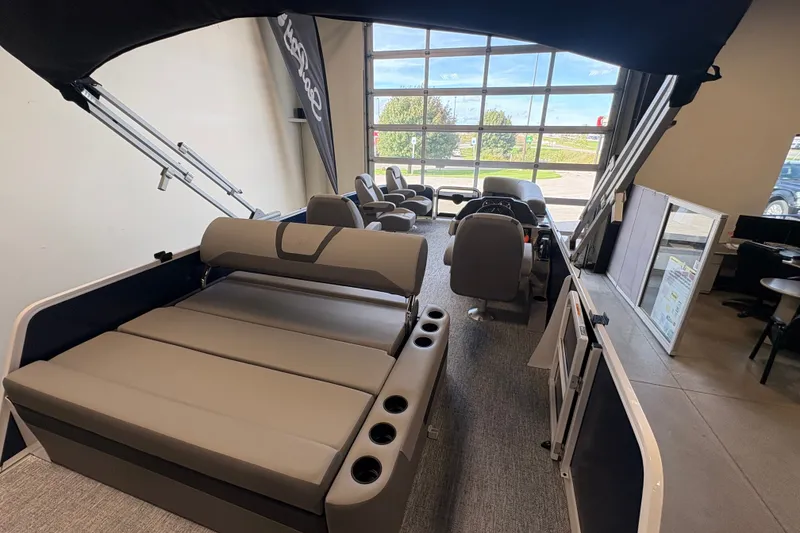Slide: The Image of 2027 Premier 220 Sunscape RL - DL pontoon boat interior with seating and helm. - 14