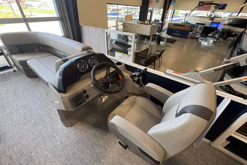 Slide: The Image of Interior of 2027 Premier 220 Sunscape RL - DL pontoon boat with modern helm and seating. - 11