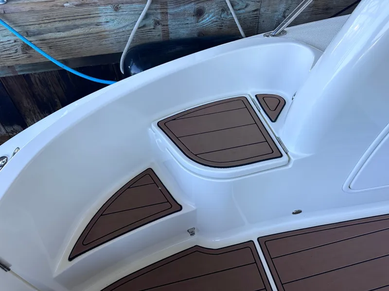 Slide: The Image of The image shows the deck of a 2009 Meridian 391 Sedan with wood-like finish. - 29