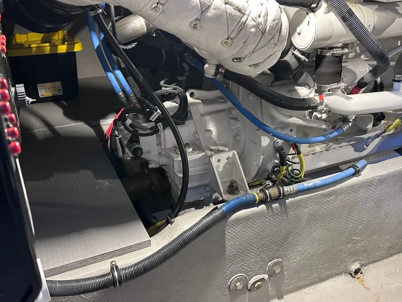 Slide: The Image of Engine room of a 2009 Meridian 391 Sedan with visible cables and hoses. - 39